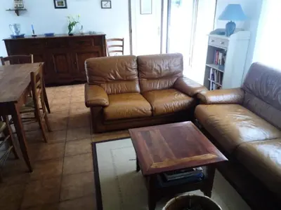 Coin salon dans l'établissement Gîte de France Les hauts de la valade 3 épis - Gîte de France 4 personnes MAE-9084