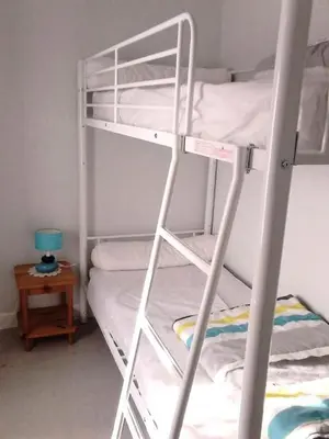 Un ou plusieurs lits dans un hébergement de l'établissement Gîte de France Gite du bourg 2 épis - Gîte de France 7 personnes MAE-9124