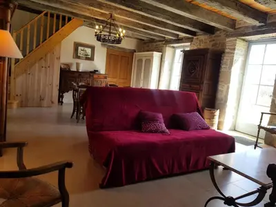 Coin salon dans l'établissement Gîte de France Gîte de duroux 3 épis - Gîte de France 6 personnes MAE-9134
