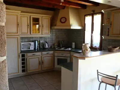 Cuisine ou kitchenette dans l'établissement Gîte de France Le fournil 3 épis - Gîte de France 4 personnes MAE-9204