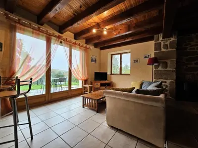 Coin salon dans l'établissement Gîte de France Le fournil 3 épis - Gîte de France 4 personnes MAE-9204