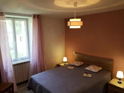 Un ou plusieurs lits dans un hébergement de l'établissement Gîte de France Chas lo fustier 3 épis - Gîte de France 4 personnes MAE-9214