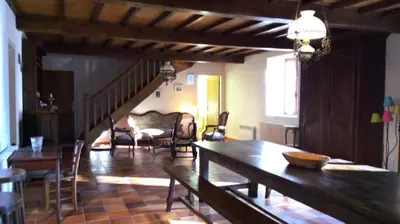 Coin salon dans l'établissement Gîte de France à Lignareix 3 épis - Gîte de France 8 personnes MAE-9224