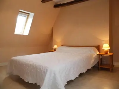 Un ou plusieurs lits dans un hébergement de l'établissement Gîte de France à Turenne 3 épis - Gîte de France 6 personnes MAE-9334