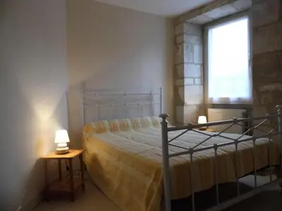 Un ou plusieurs lits dans un hébergement de l'établissement Gîte de France à Turenne 3 épis - Gîte de France 6 personnes MAE-9334