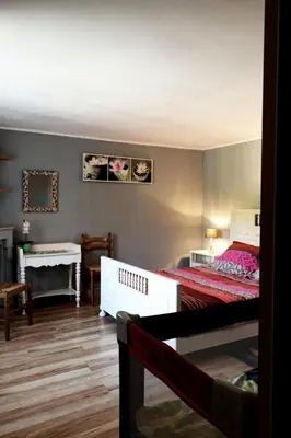 Un ou plusieurs lits dans un hébergement de l'établissement Gîte de France Les palinières 3 épis - Gîte de France 4 personnes MAE-9384