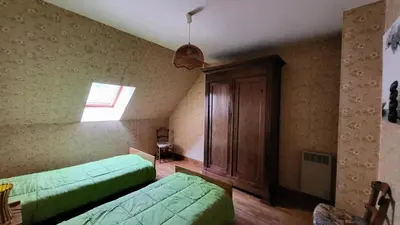 Un ou plusieurs lits dans un hébergement de l'établissement Gîte de France Grand 2 épis - Gîte de France 6 personnes MAE-9454