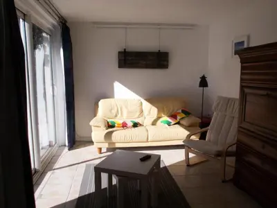 Coin salon dans l'établissement Gîte de France Le noyer 2 épis - Gîte de France 2 personnes MAE-9474