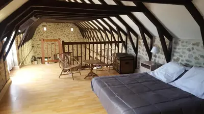 Coin salon dans l'établissement Gîte de France Gîte de la xaintrie 2 épis - Gîte de France 4 personnes MAE-9534