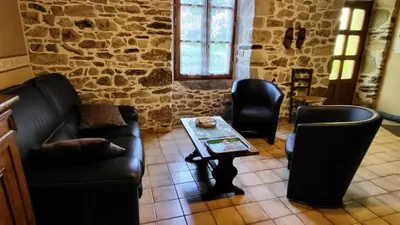 Coin salon dans l'établissement Gîte de France Petit 2 épis - Gîte de France 4 personnes MAE-9634