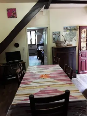 Coin salon dans l'établissement Gîte de France à Sioniac 2 épis - Gîte de France 5 personnes MAE-9744