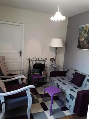 Coin salon dans l'établissement Gîte de France à Sioniac 2 épis - Gîte de France 5 personnes MAE-9744