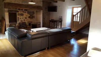Coin salon dans l'établissement Gîte de France Maison raymond 3 épis - Gîte de France 12 personnes MAE-9804