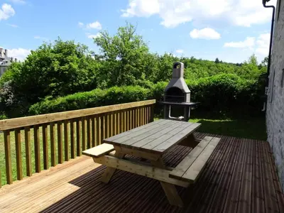 Balcon ou terrasse dans l'établissement Gîte de France Maison raymond 3 épis - Gîte de France 12 personnes MAE-9804