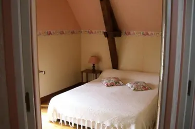 Un ou plusieurs lits dans un hébergement de l'établissement Gîte de France à Puy-d'Arnac 3 épis - Gîte de France 4 personnes MAE-9864