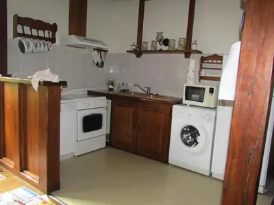 Cuisine ou kitchenette dans l'établissement Gîte de France La ferme de polprat 2 épis - Gîte de France 4 personnes MAE-9914
