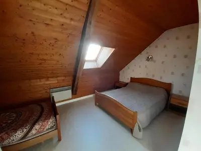Un ou plusieurs lits dans un hébergement de l'établissement Gîte de France à Lamazière-Haute 2 épis - Gîte de France 5 personnes MAE-9934