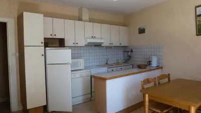 Cuisine ou kitchenette dans l'établissement Gîte de France Le gîte des 3 2 épis - Gîte de France 4 personnes MAE-0004