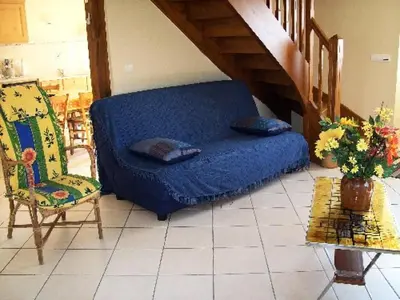 Coin salon dans l'établissement Gîte de France à Le Chastang 3 épis - Gîte de France 6 personnes MAE-0114