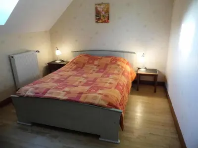 Un ou plusieurs lits dans un hébergement de l'établissement Gîte de France à Le Chastang 3 épis - Gîte de France 6 personnes MAE-0114