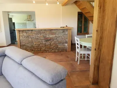 Coin salon dans l'établissement Gîte de France Gîte bel air 3 épis - Gîte de France 6 personnes MAE-0124