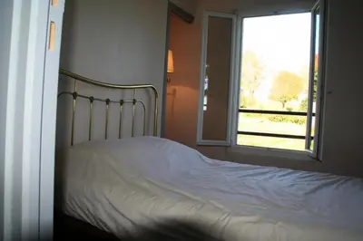 Un ou plusieurs lits dans un hébergement de l'établissement Gîte de France Monédières 3 épis - Gîte de France 2 personnes MAE-0224