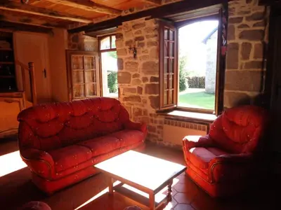 Coin salon dans l'établissement Gîte de France La bachellerie 2 épis - Gîte de France 5 personnes MAE-0264