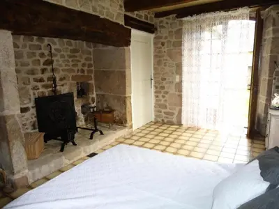 Un ou plusieurs lits dans un hébergement de l'établissement Gîte de France La bachellerie 2 épis - Gîte de France 5 personnes MAE-0264