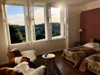 Un ou plusieurs lits dans un hébergement de l'établissement Gîte de France A perle de vue 4 épis - Gîte de France 14 personnes MAE-0294