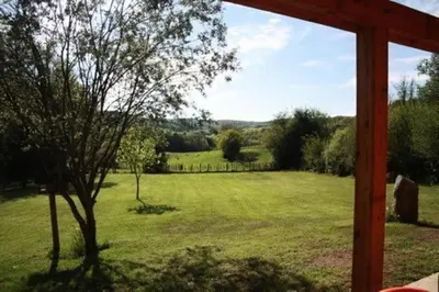 Jardin de l'établissement Gîte de France à Saint-Germain-Lavolps 3 épis - Gîte de France 4 personnes MAE-0314