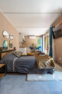 Un ou plusieurs lits dans un hébergement de l'établissement Chambre d'hôtes de la dame blanche