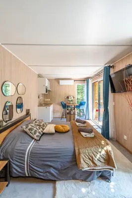Un ou plusieurs lits dans un hébergement de l'établissement Chambre d'hôtes de la dame blanche