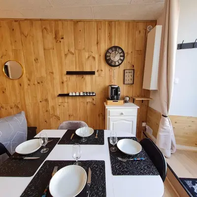 Coin salon dans l'établissement Bel appartement « Les Monts du Cantal »