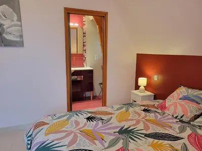 Un ou plusieurs lits dans un hébergement de l'établissement La jolie Villa du Pesquier