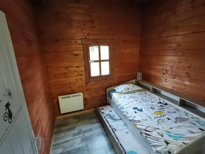 Un ou plusieurs lits dans un hébergement de l'établissement Bienvenue au CHAT LAIT - Chalet - Gîte 4 pièces - 70m - Cosy
