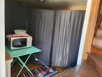 Télévision ou salle de divertissement dans l'établissement la chambre d'Axelle