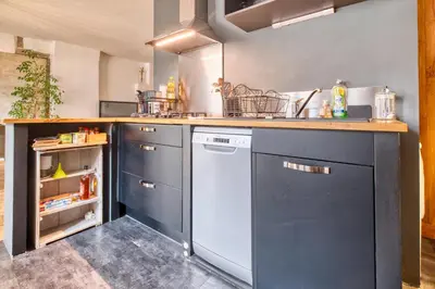 Cuisine ou kitchenette dans l'établissement Les apparts du TRECH