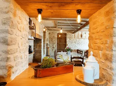 Coin salon dans l'établissement Domaine de Faugeras