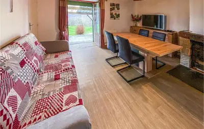 Télévision ou salle de divertissement dans l'établissement Holiday Home La Barrière - 02