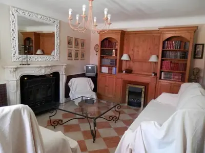 Coin salon dans l'établissement Gîte Adrienne au Theil