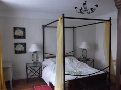 Un ou plusieurs lits dans un hébergement de l'établissement Gîte Adrienne au Theil