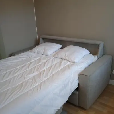 Un ou plusieurs lits dans un hébergement de l'établissement Appartement Centre Ville MONT DORE Vacances et Week-End Classé 3 Etoiles