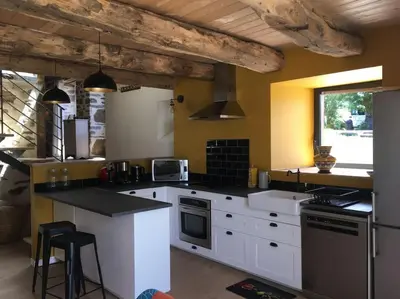 Cuisine ou kitchenette dans l'établissement Gîte du Milan royal