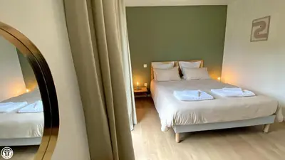 Un ou plusieurs lits dans un hébergement de l'établissement Breakislebed 3 Maisons CHU LIMOGES
