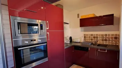 Cuisine ou kitchenette dans l'établissement Le P'tit Choux 1 Etoile