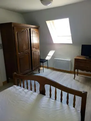 Un ou plusieurs lits dans un hébergement de l'établissement Appartement confortable à La Bourboule, 64 m², balcons agréables
