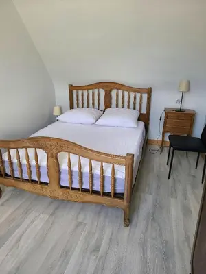 Un ou plusieurs lits dans un hébergement de l'établissement Appartement confortable à La Bourboule, 64 m², balcons agréables