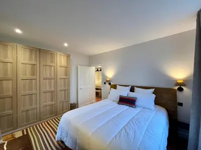 Un ou plusieurs lits dans un hébergement de l'établissement Charmant T3 au Mont-Dore, jusqu'à 4 pers, wifi, vue Puy Gros - FR-1-608-265