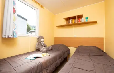 Un ou plusieurs lits dans un hébergement de l'établissement ZEcamping 4 étoiles familial - parc aqua et soirées animées