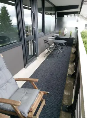 Coin salon dans l'établissement Appartement plein cœur Super-Besse